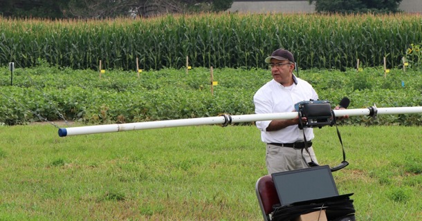 During the Panhandle Ag Research Technology Tour in September 2024, Mohamed Khalil explains how the frequency domain electromagnetic equipment helps with irrigation. (Chabella Guzman/PREEC)