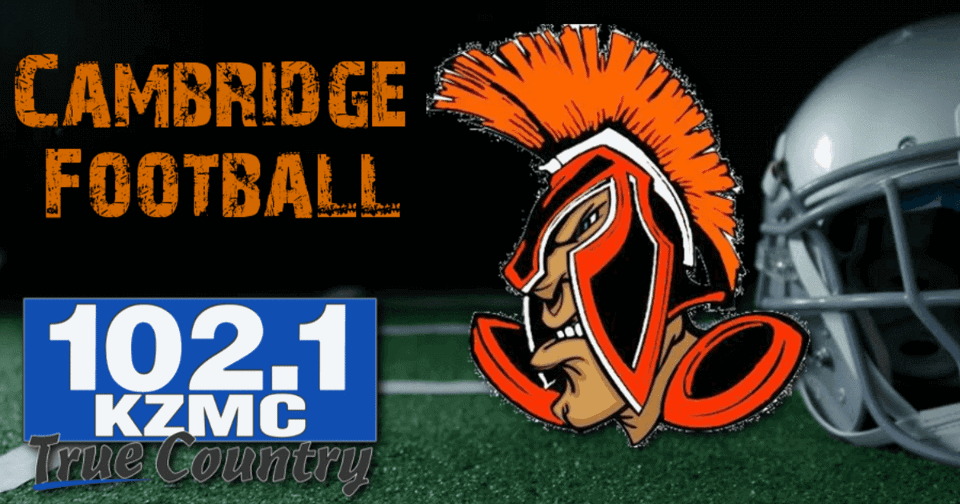 Football field in the background with the Cambridge Mascot on the right, the words Cambridge football on the upper left corner and the KZMC-FM 102.1 logo on the bottom right.